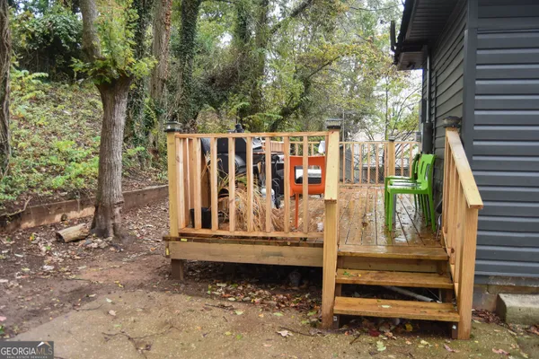 a view of entrance gate with trees