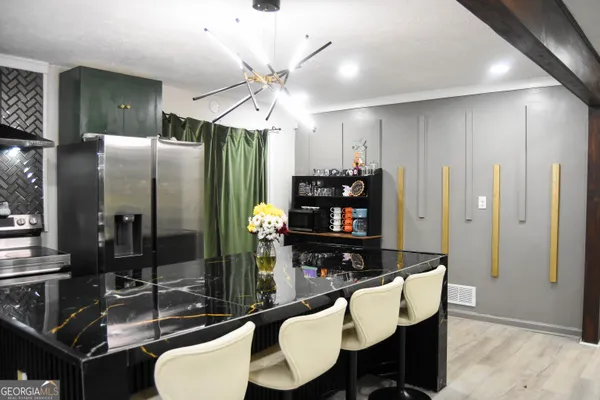 a view of a dining room with furniture
