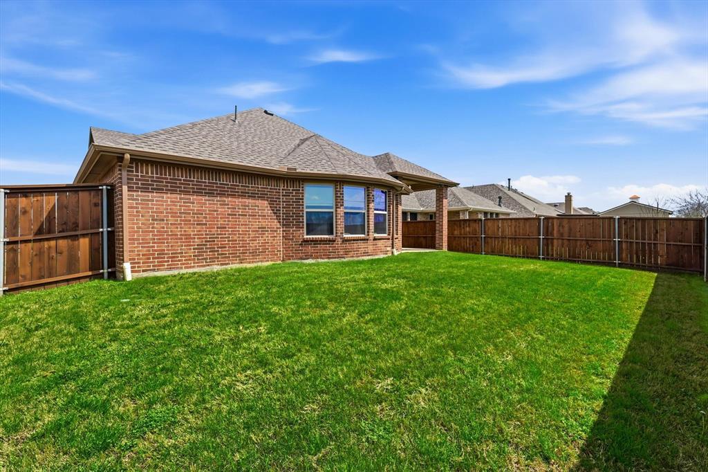 9728 Bitterroot Drive Little Elm, TX 75068 - Photo 33 of 39 View of large fenced backyard!