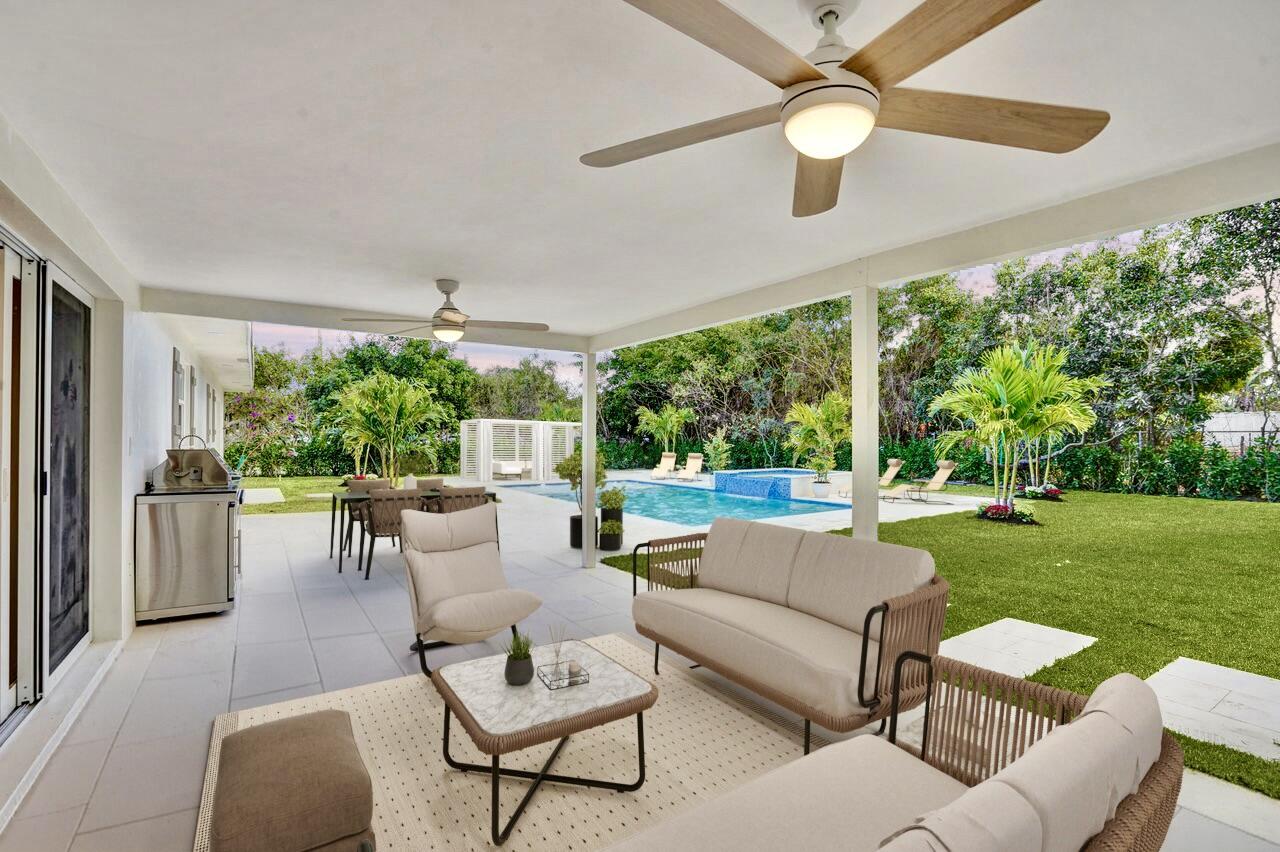 200 Northwest 2nd Street Delray Beach, FL 33444 - Photo 11 of 44 a living room with furniture and a large window
