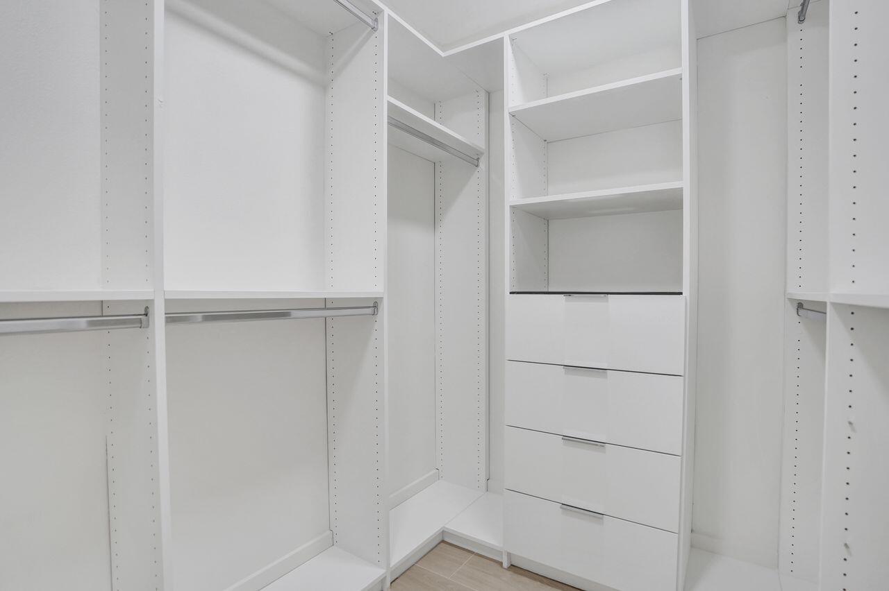 200 Northwest 2nd Street Delray Beach, FL 33444 - Photo 24 of 44 a view of walk in closet with empty racks
