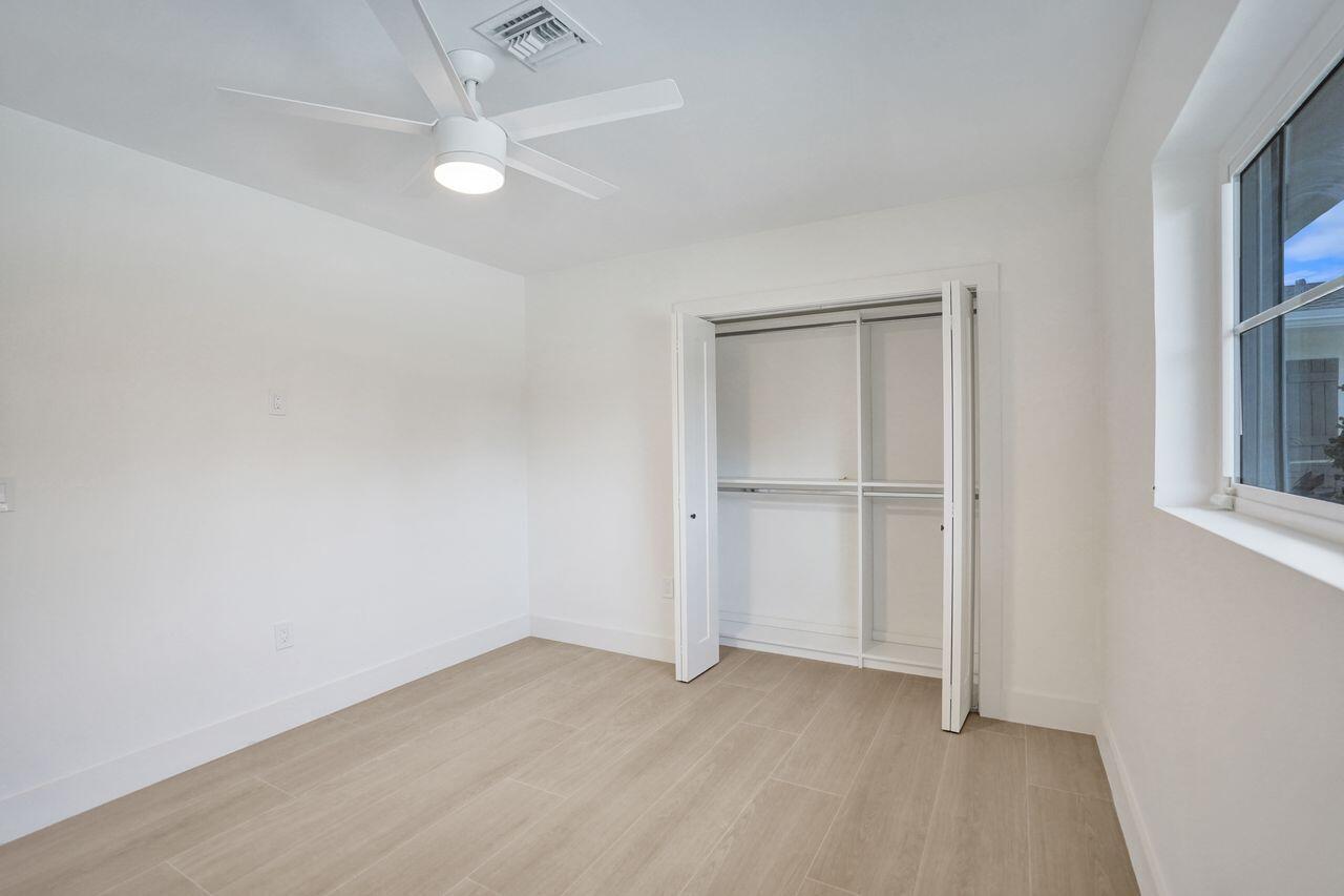 200 Northwest 2nd Street Delray Beach, FL 33444 - Photo 32 of 44 an empty room with a empty space and windows