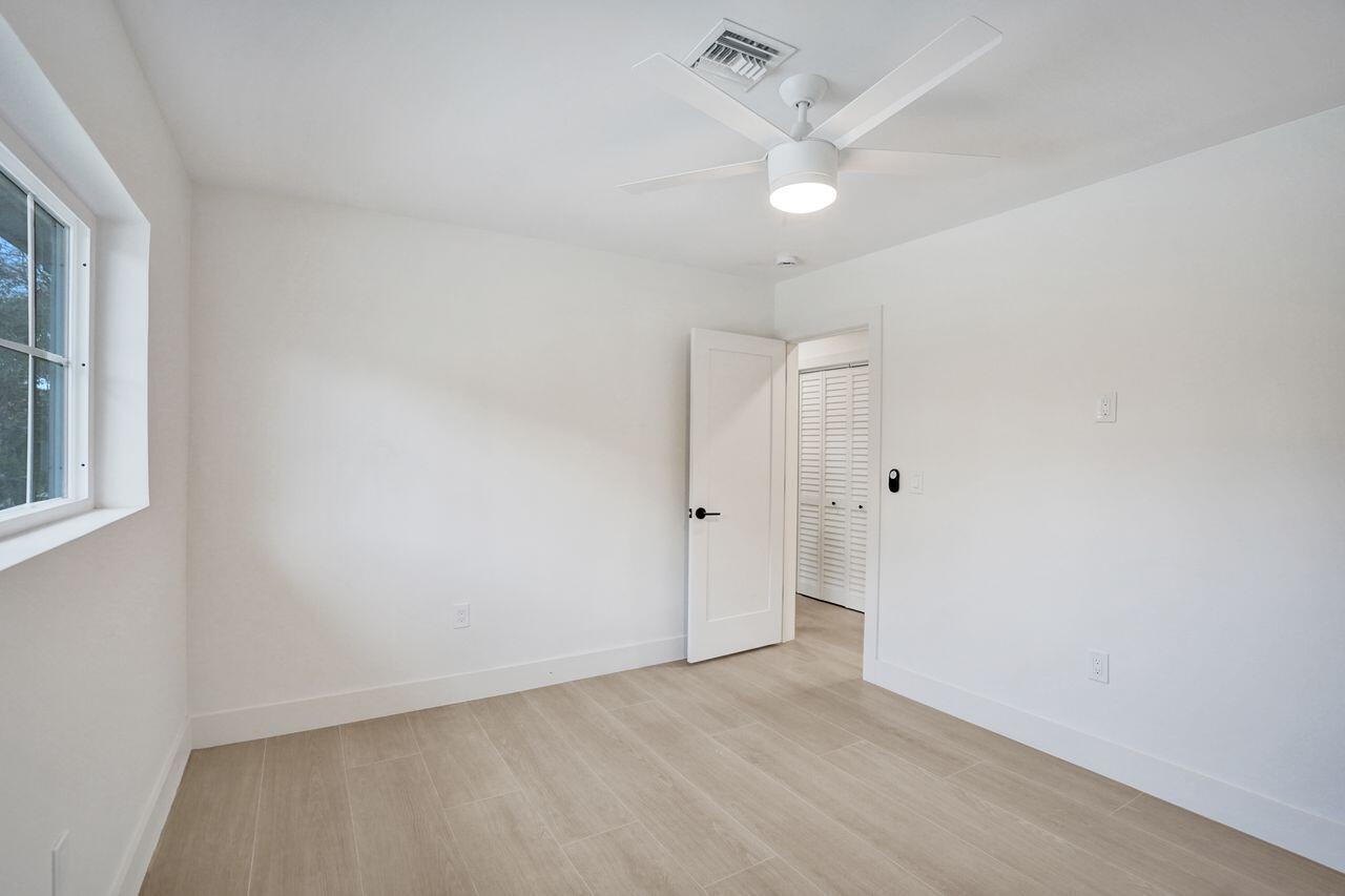 200 Northwest 2nd Street Delray Beach, FL 33444 - Photo 33 of 44 wooden floor in an empty room