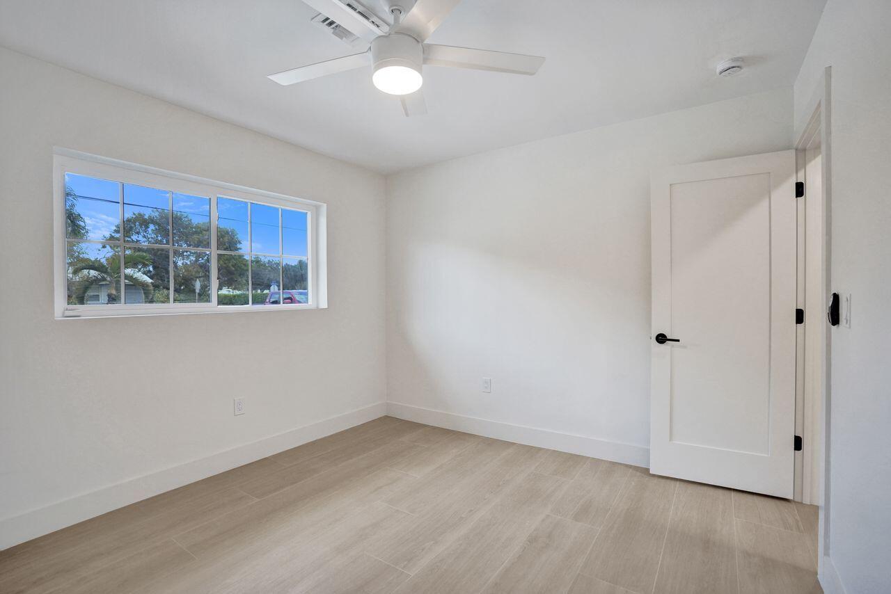 200 Northwest 2nd Street Delray Beach, FL 33444 - Photo 34 of 44 a view of an empty room with a window