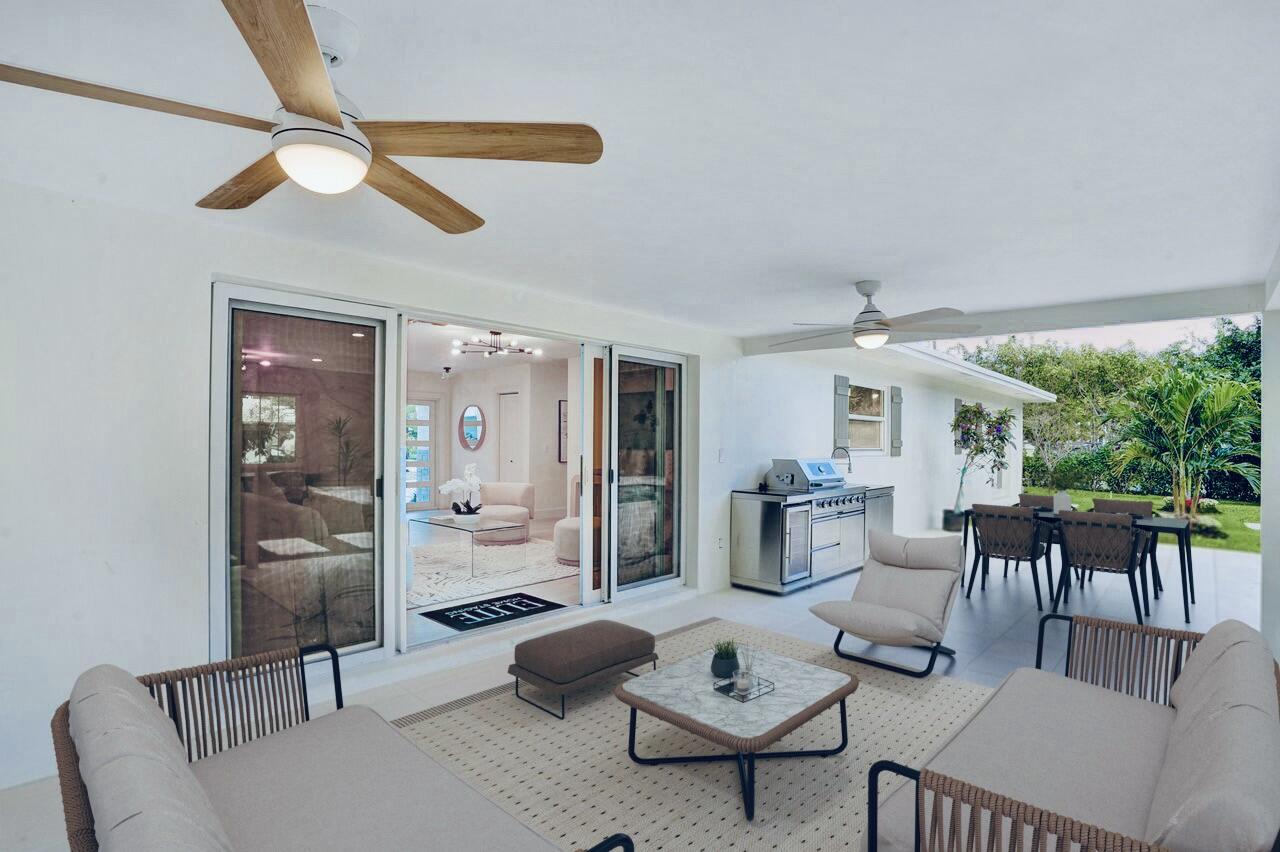 200 Northwest 2nd Street Delray Beach, FL 33444 - Photo 5 of 44 a living room with furniture and a large window