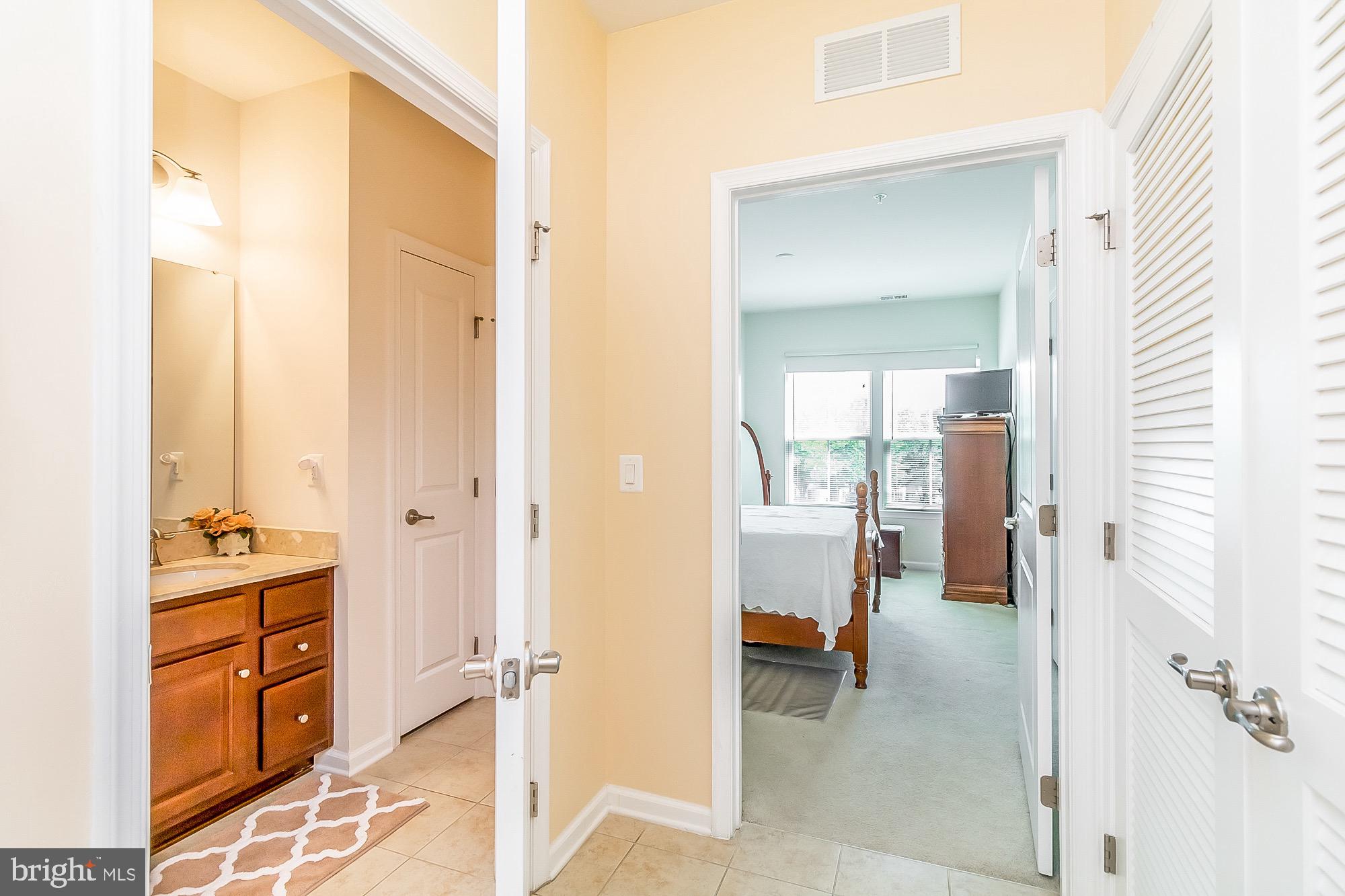 8370 Ice Crystal Drive, Unit E Laurel, MD 20723 - Photo 19 of 34 Hallway to second bedroom