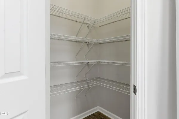 a empty closet with white paint