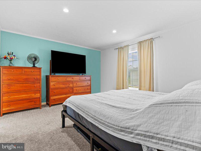 501 Windy Hill Road Shermans Dale, PA 17090 - Photo 14 of 26 a bedroom with a bed and a flat screen tv