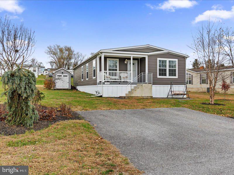 501 Windy Hill Road Shermans Dale, PA 17090 - Photo 2 of 26 a front view of house with yard and green space