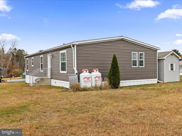 a front view of house with yard