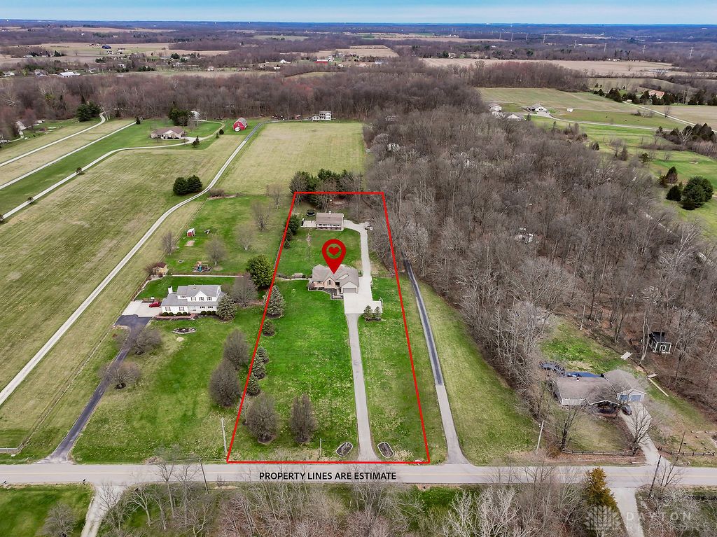7400 Cook-Jones Road Waynesville, OH 45068 - Photo 4 of 72 This expansive aerial view showcases a property with extensive grounds and tranquil surroundings.