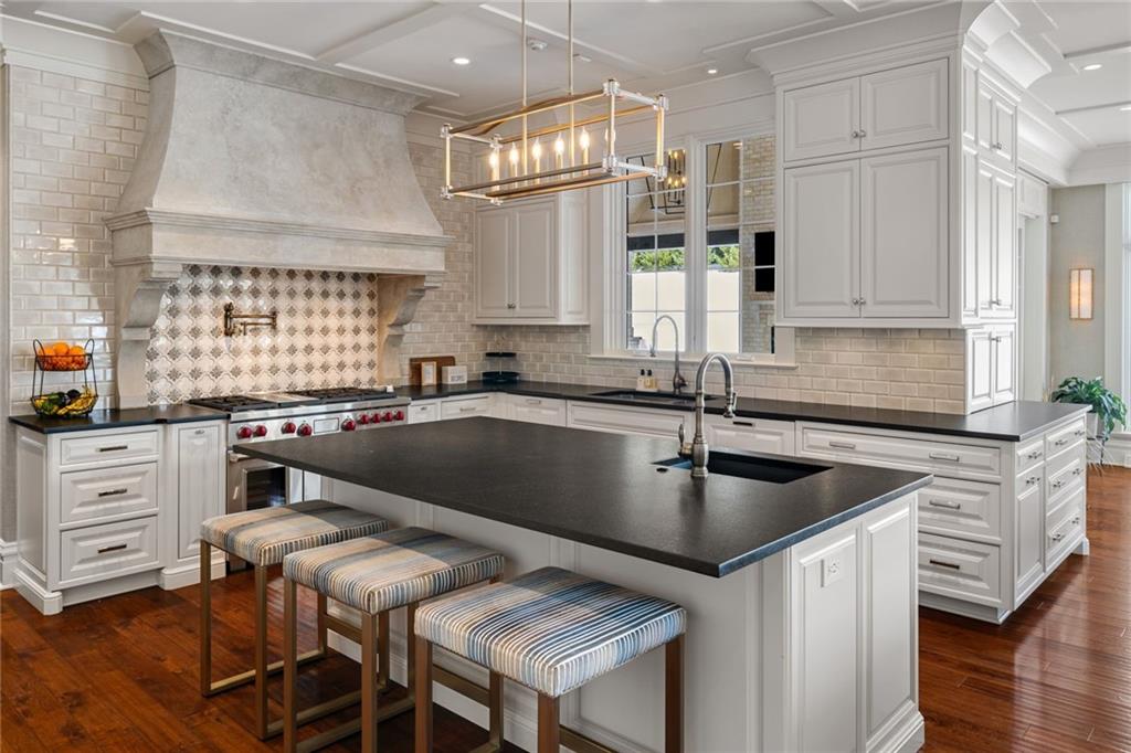 435 Myoma Road Mars, PA 16046 - Photo 11 of 50 Elegant kitchen with expansive stone counters, refined cabinetry and a thoughtful layout for effortless entertaining.