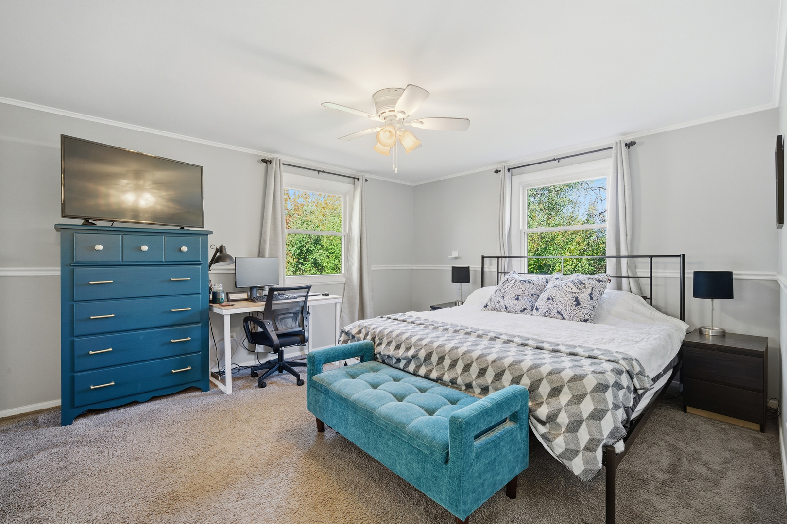 484 Chatham Circle Buffalo Grove, IL 60089 - Photo 16 of 28 a bedroom with a bed and a flat screen tv