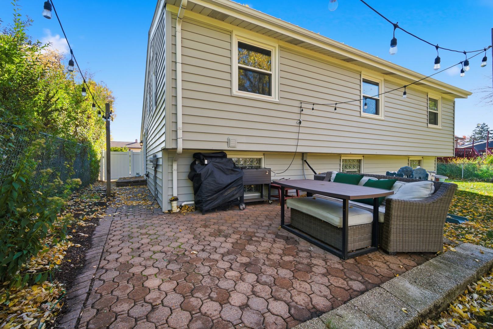 484 Chatham Circle Buffalo Grove, IL 60089 - Photo 25 of 28 a view of a chairs setting on the deck