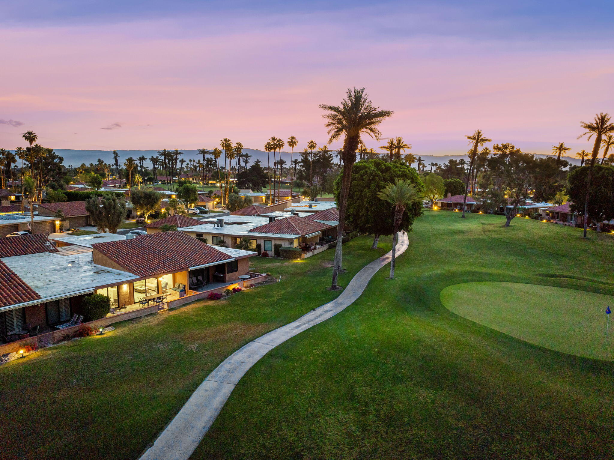 10 Palma Drive Rancho Mirage, CA 92270 - Photo 31 of 51 a view of a lake with a city