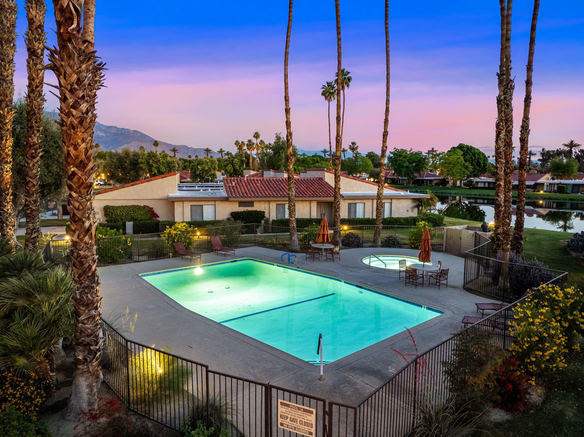 10 Palma Drive Rancho Mirage, CA 92270 - Photo 41 of 51 a swimming pool with outdoor seating and city view
