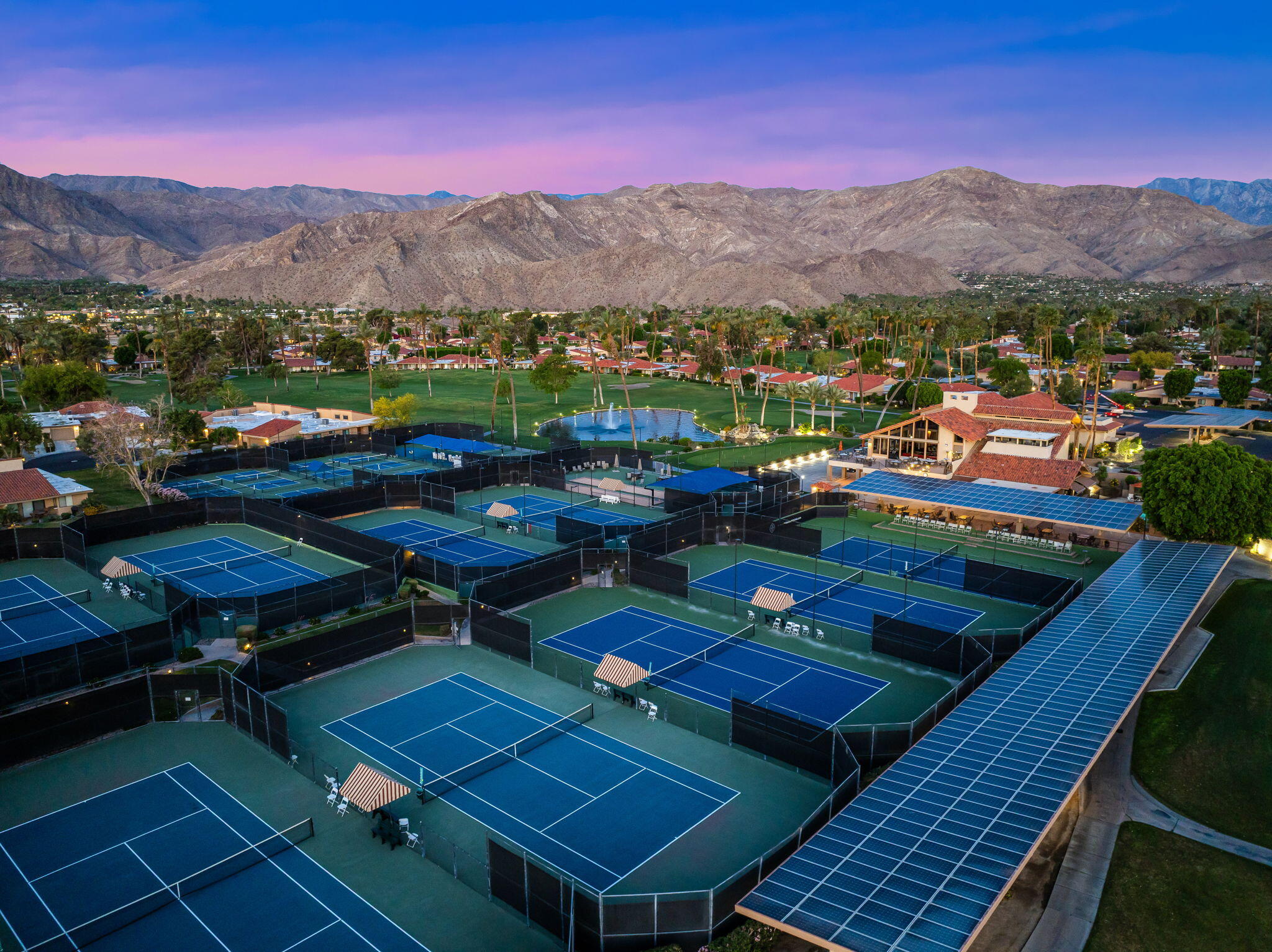 10 Palma Drive Rancho Mirage, CA 92270 - Photo 49 of 51 a view of a balcony with chairs and a potted plant