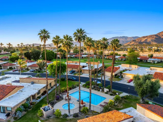 a view of a golf course with a lake
