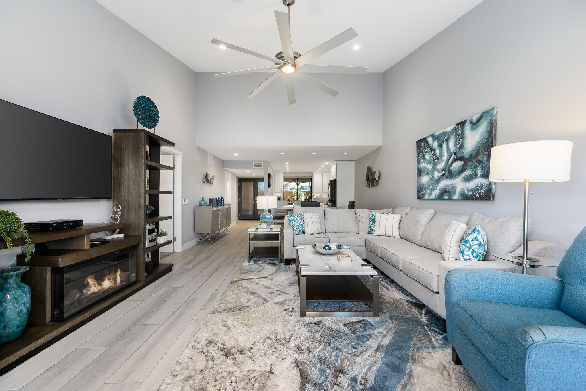 10 Palma Drive Rancho Mirage, CA 92270 - Photo 7 of 51 a living room with furniture and a flat screen tv