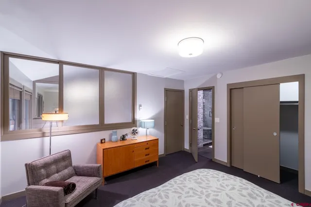 a bathroom with a bathtub and a sink