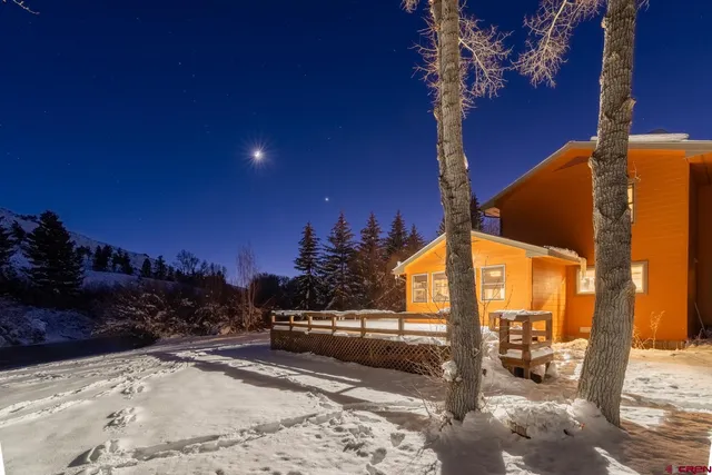 a view of an ocean from a mountain