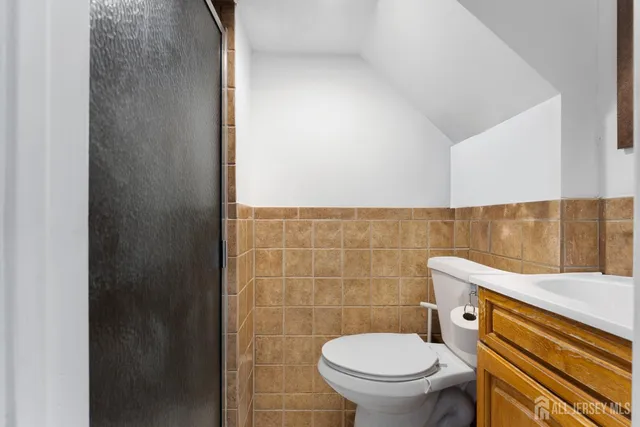 a bathroom with a toilet and a sink