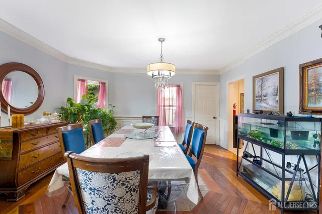 a kitchen with stainless steel appliances kitchen island granite countertop a stove and a sink