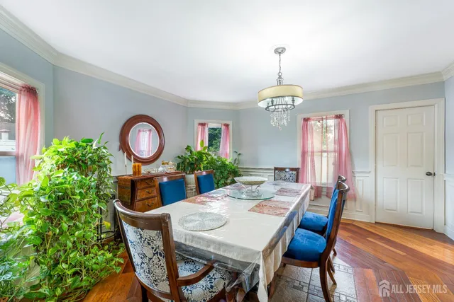 a kitchen with stainless steel appliances granite countertop a stove refrigerator sink and microwave