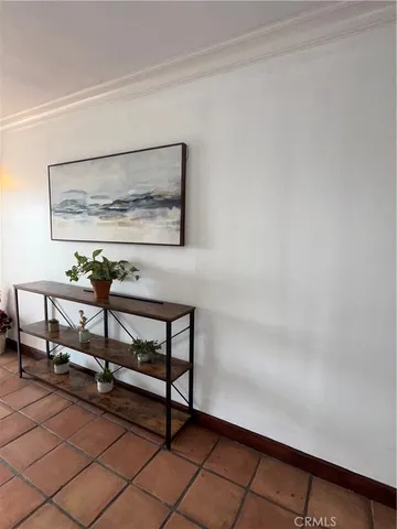 a view of a chairs and tables in the balcony