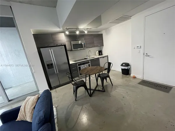 a view of a room with furniture