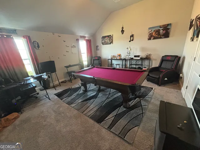 a room with furniture and window