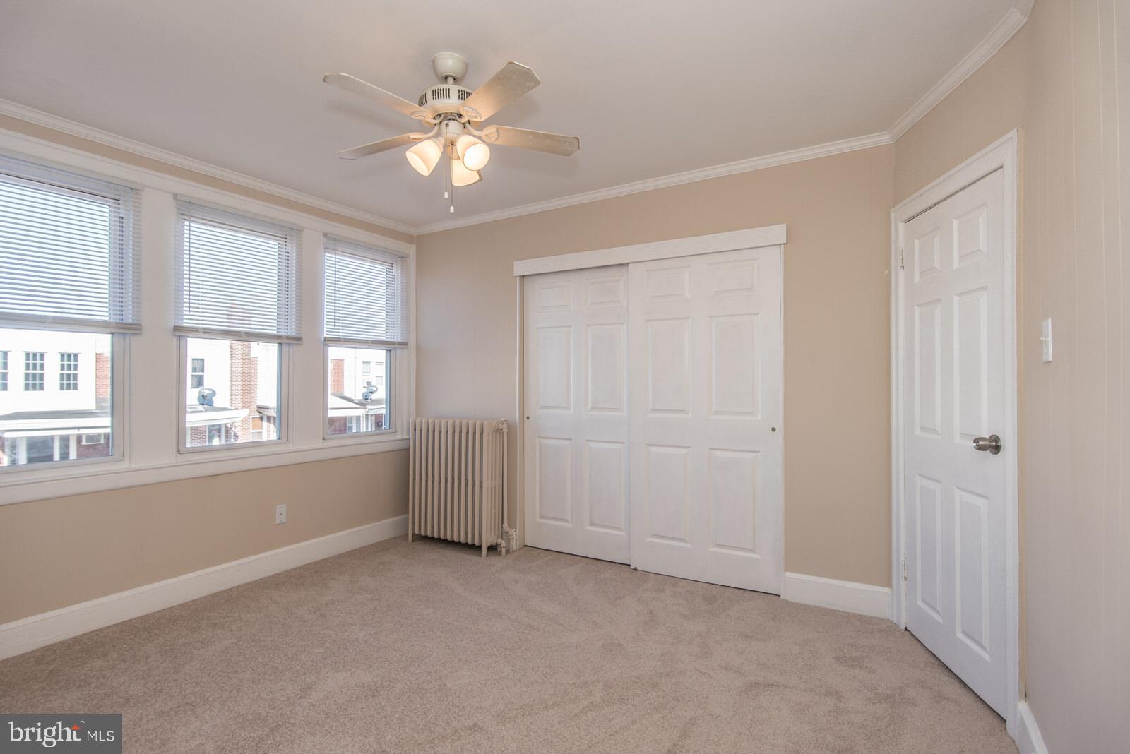 7119 Gillespie Street Philadelphia, PA 19135 - Photo 22 of 47 a view of an empty room with a window