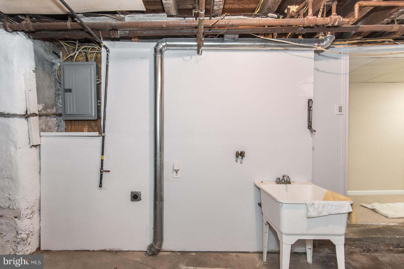 7119 Gillespie Street Philadelphia, PA 19135 - Photo 41 of 47 a view of a room with shelves