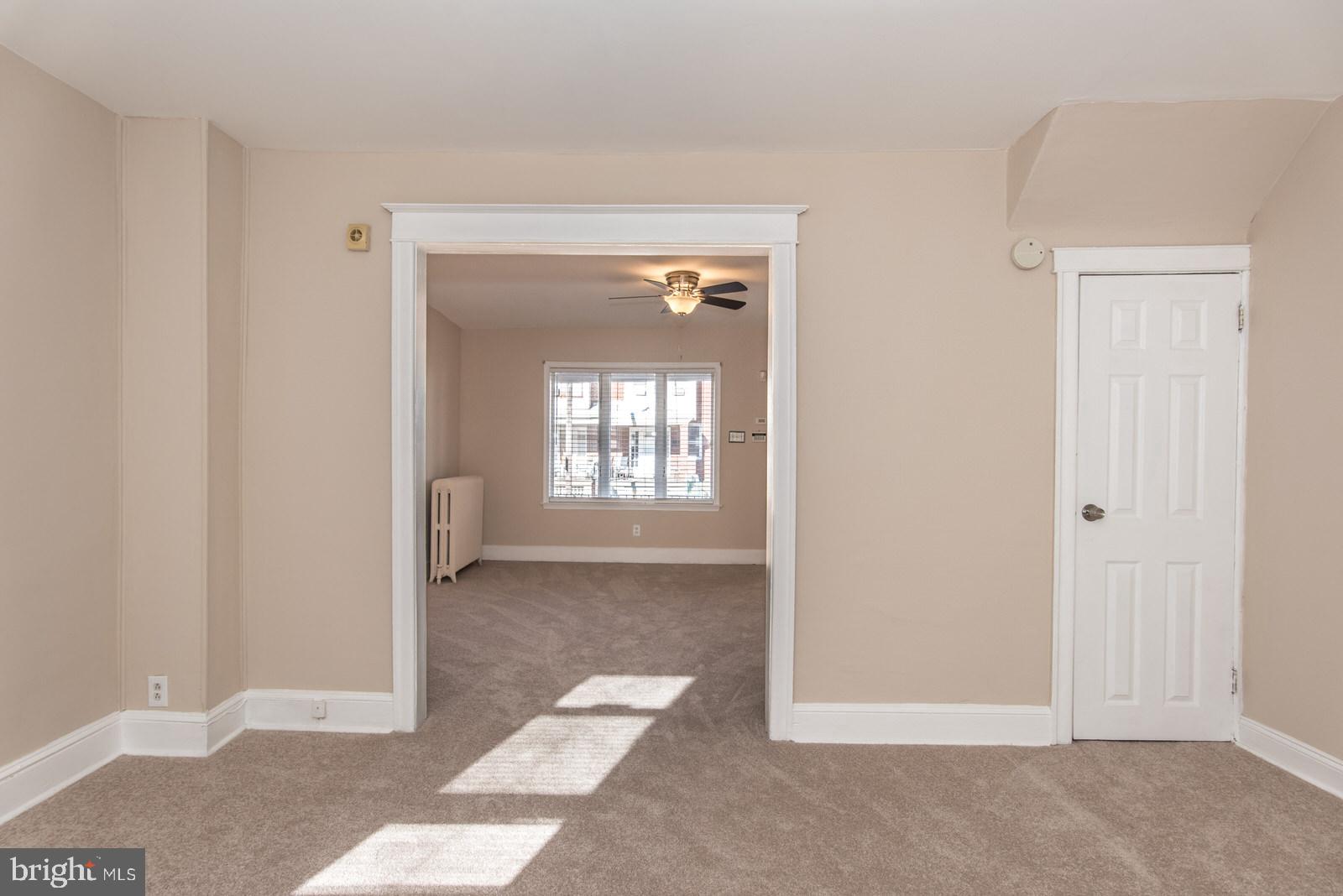 7119 Gillespie Street Philadelphia, PA 19135 - Photo 10 of 47 a view of an empty room with window