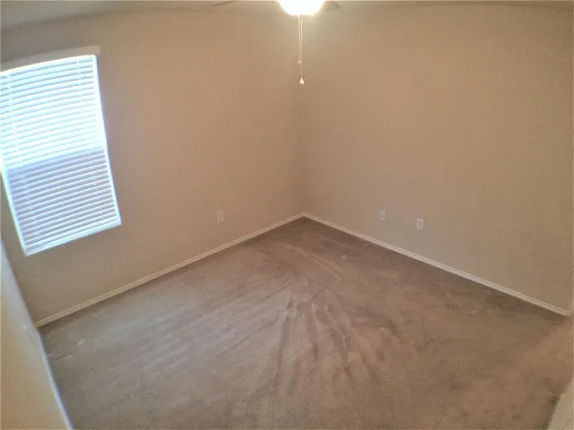 a kitchen with stainless steel appliances granite countertop a refrigerator stove a sink and dishwasher