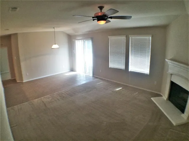 a kitchen with stainless steel appliances granite countertop wooden cabinets a sink and dishwasher
