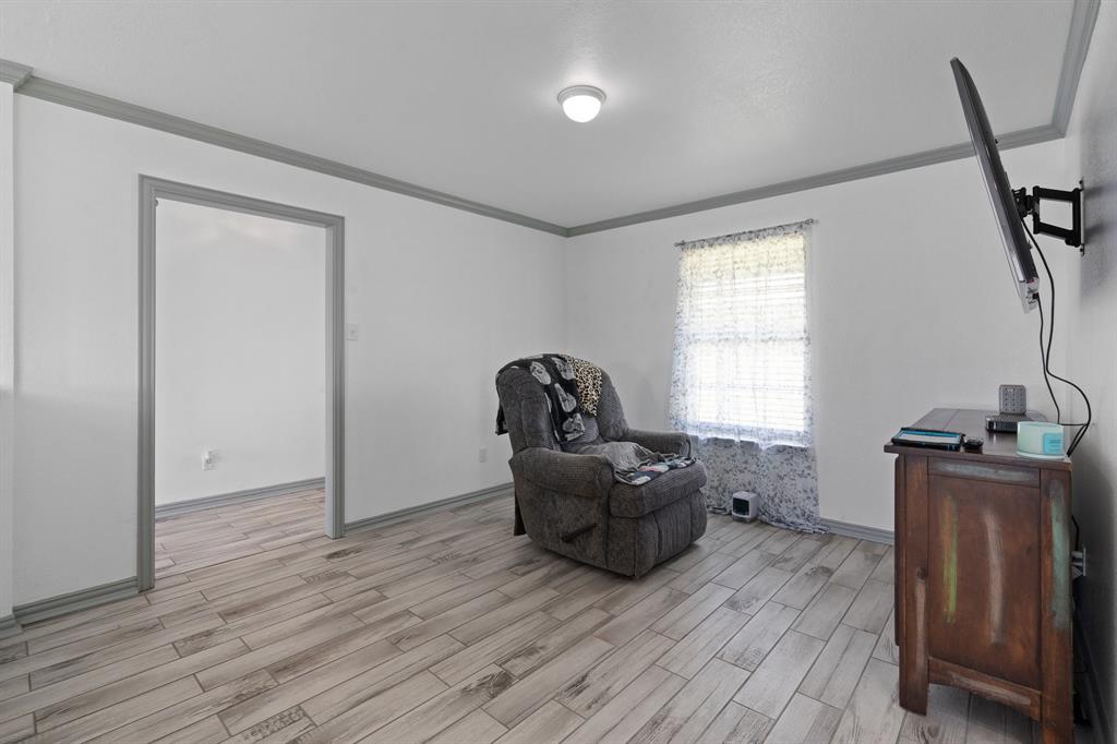 2600 Dave Angel Road Burleson, TX 76028 - Photo 13 of 31 a living room with furniture and a window