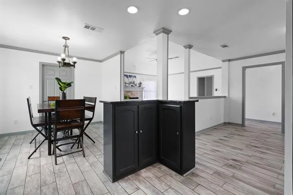 a view of a kitchen and dining room