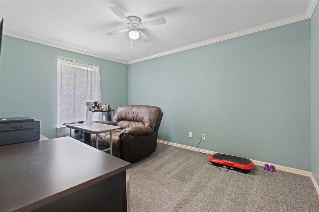 2600 Dave Angel Road Burleson, TX 76028 - Photo 23 of 31 a living room with furniture and a table