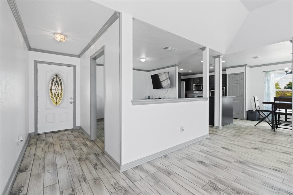 2600 Dave Angel Road Burleson, TX 76028 - Photo 9 of 31 a view of a kitchen cabinets and wooden floor