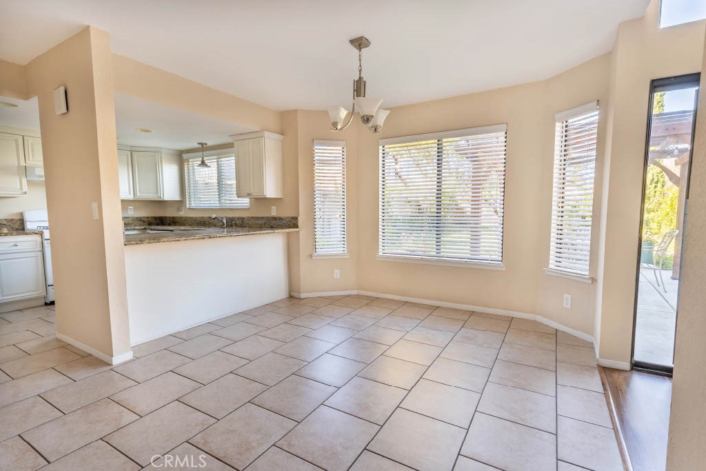 1217 Iris Court Lompoc, CA 93436 - Photo 7 of 29 a view of a kitchen with a sink and a window