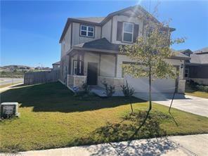 149 Buttonwood Drive Buda, TX 78610 - Photo 1 of 1 a front view of a house with a yard