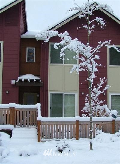 135 Sky Ridge Road Northwest, Unit 104 Issaquah, WA 98027 - Photo 1 of 1 a front view of a house