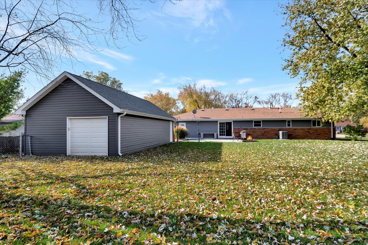 302 North Raven Road Shorewood, IL 60404 - Photo 26 of 26 a house view with a garden space