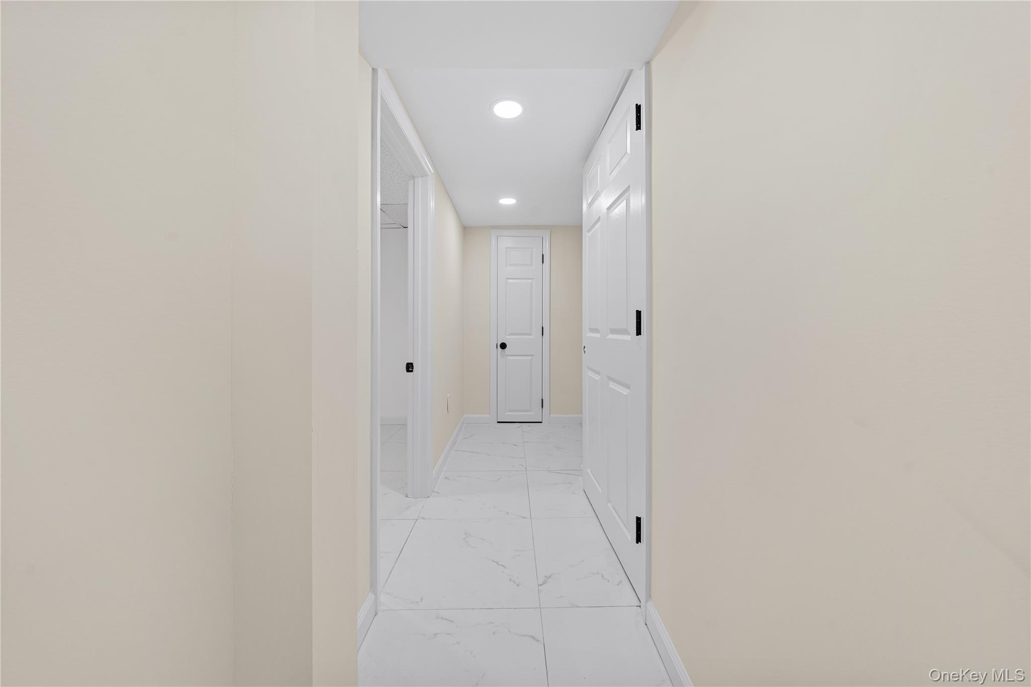 57 Eastwood Road Miller Place, NY 11764 - Photo 24 of 45 a view of a hallway
