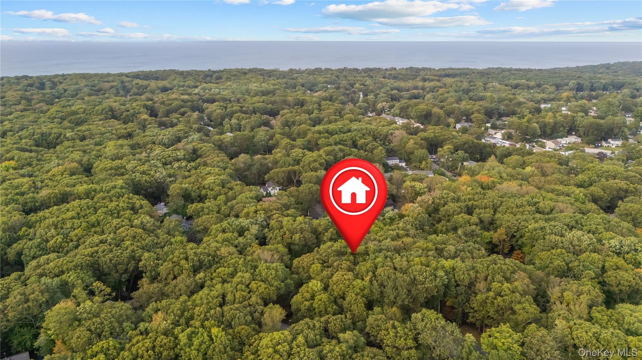 57 Eastwood Road Miller Place, NY 11764 - Photo 44 of 45 a view of a outdoor space with mountain view