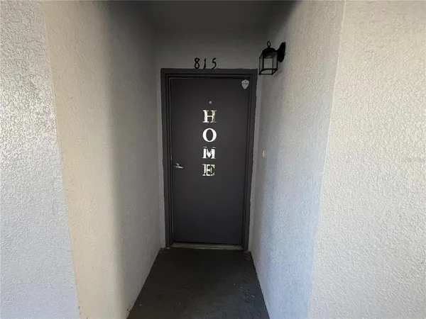a kitchen with a refrigerator sink and microwave