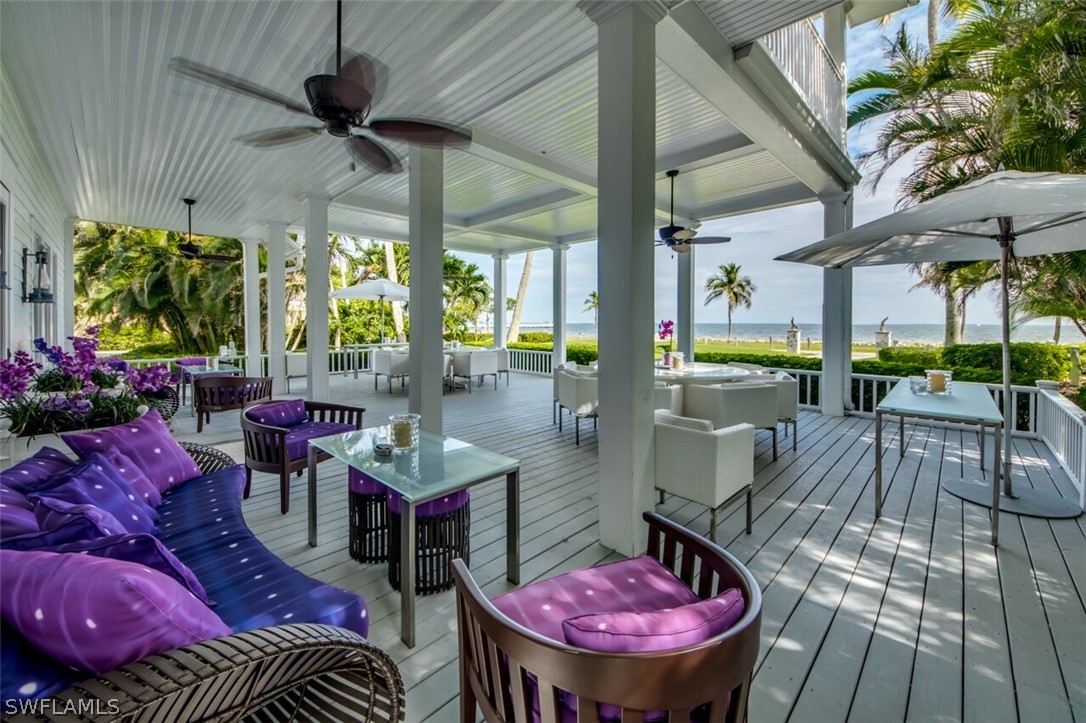8241 Main Street Bokeelia, FL 33922 - Photo 24 of 35 a view of a chairs and table in a patio