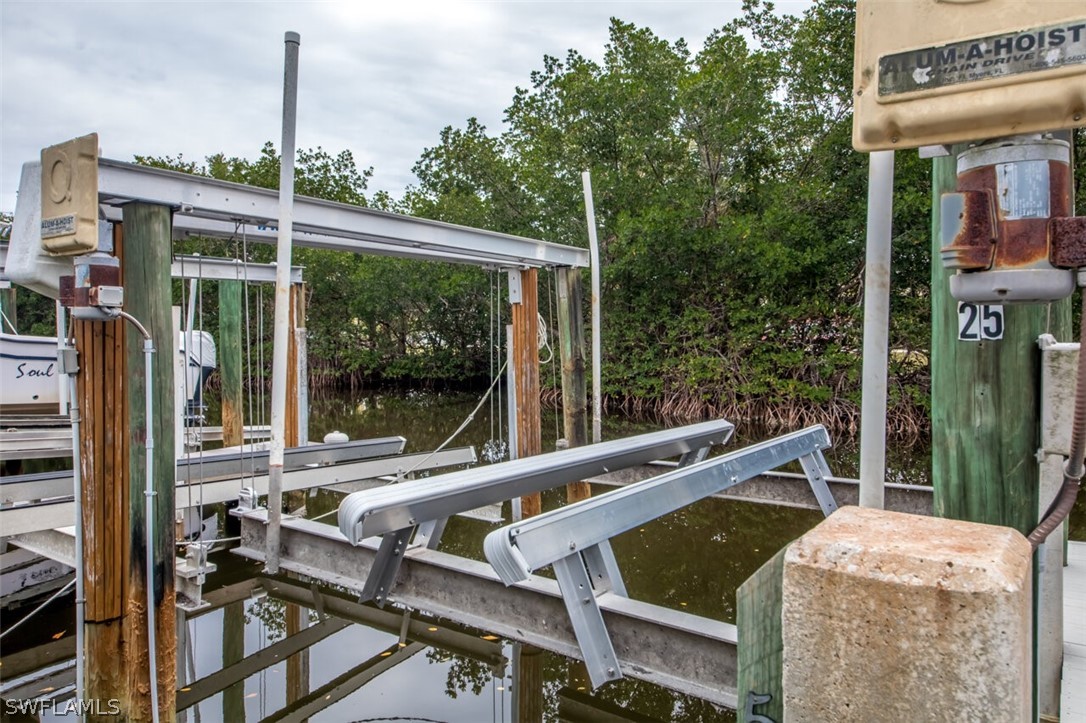 8241 Main Street Bokeelia, FL 33922 - Photo 35 of 35 a view of balcony with couch and chairs