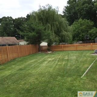 39 Montview Road Edison, NJ 08837 - Photo 3 of 5 a view of a backyard with a small cabin